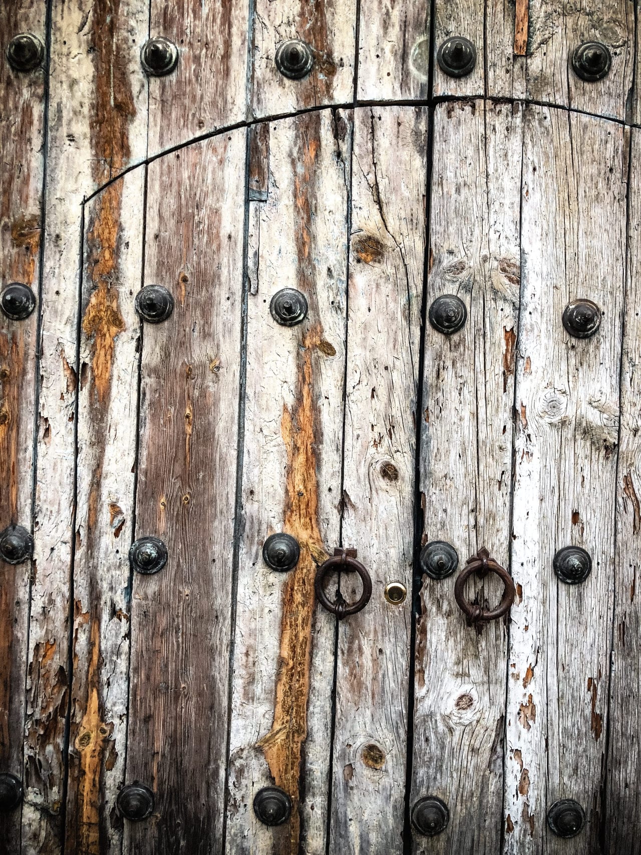 Old planks held by iron studs